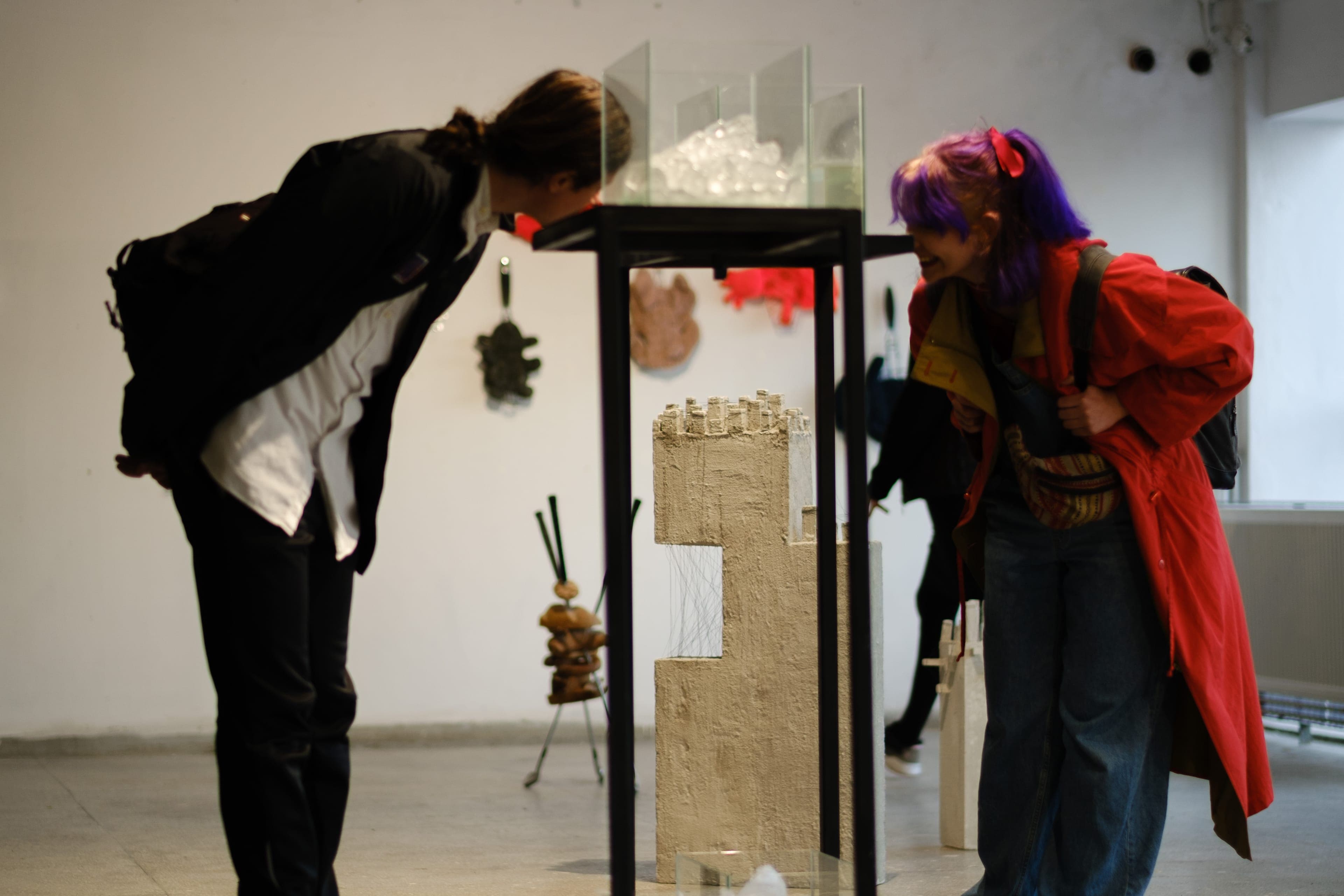 Visitors examining a sculpture at ZSB 2023
